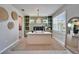 Charming home office with custom built-ins, a large desk, and a cozy rug at 4904 Eagle Rock Dr, Wimauma, FL 33598