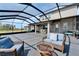 Outdoor patio showcasing comfortable seating and picturesque views for ultimate relaxation and entertainment at 4904 Eagle Rock Dr, Wimauma, FL 33598