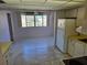 Functional kitchen with standard appliances and view into adjacent living space at 5095 Bay Ne St # 310, St Petersburg, FL 33703