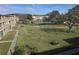A shared pool area surrounded by chairs and lush greenery, offering a relaxing outdoor amenity at 5095 Bay Ne St # 310, St Petersburg, FL 33703