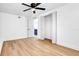 Bedroom featuring ceiling fan and closet at 5712 Mallow St, New Port Richey, FL 34652