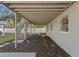 Spacious area under the house, featuring a staircase, providing additional storage and utility space at 5713 23Rd S Ave, Gulfport, FL 33707