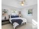 Inviting bedroom featuring a comfortable bed, stylish decor, and ample natural light at 5713 23Rd S Ave, Gulfport, FL 33707