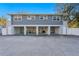 Large two-story home has three car garage on lower level at 5713 23Rd S Ave, Gulfport, FL 33707