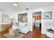 Open concept living area with coastal decor, wicker accents, and clear views to the adjoining kitchen space at 5713 23Rd S Ave, Gulfport, FL 33707