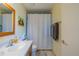 Bathroom featuring a modern vanity, toilet, and a bathtub-shower combination at 663 Allegheny Dr, Sun City Center, FL 33573