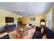 Bright living room with a large window, modern furniture, and hardwood floors for a cozy, inviting atmosphere at 663 Allegheny Dr, Sun City Center, FL 33573