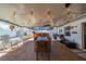Covered patio featuring outdoor dining and bar area, ideal for relaxation and entertaining at 663 Allegheny Dr, Sun City Center, FL 33573