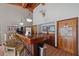 Wet bar featuring wood counters and barstool seating, with wood accents at 6701 River Run Blvd, Weeki Wachee, FL 34607