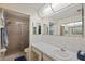Clean bathroom with modern fixtures, a spacious vanity, and a glass-enclosed shower at 6701 River Run Blvd, Weeki Wachee, FL 34607