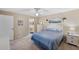 Bright bedroom with a view to the en suite bathroom offers natural light and a peaceful ambiance at 6701 River Run Blvd, Weeki Wachee, FL 34607