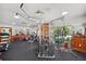 Fitness center with modern exercise equipment and ample natural light at 6701 River Run Blvd, Weeki Wachee, FL 34607