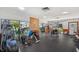 Gym with modern equipment and large windows with a view to the outside at 6701 River Run Blvd, Weeki Wachee, FL 34607