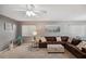 Comfortable living room featuring plush seating, ample natural light, and stylish decor elements at 6701 River Run Blvd, Weeki Wachee, FL 34607