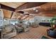 Open lounge with fireplace, pool table, wet bar and ample seating at 6701 River Run Blvd, Weeki Wachee, FL 34607
