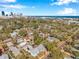 An elevated view showcases the picturesque neighborhood with a cityscape backdrop, blending urban convenience with suburban charm at 689 Paris S Ave, St Petersburg, FL 33701