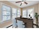 Bright office space featuring large windows, desk, and neutral decor at 689 Paris S Ave, St Petersburg, FL 33701