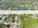 Aerial view of a home near a park, highway, and neighborhood at 710 E Plymouth St, Tampa, FL 33603