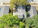 An aerial view of a home with mature trees and a small backyard at 710 E Plymouth St, Tampa, FL 33603