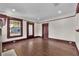 Bright and spacious living room with dark hardwood floors, and open concept floor plan at 710 E Plymouth St, Tampa, FL 33603
