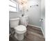Updated bathroom features a toilet, vanity, and modern fixtures at 710 Seminole, Clearwater, FL 33755