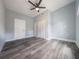 Spacious bedroom featuring hardwood floors, ample closet space, and fresh paint at 710 Seminole, Clearwater, FL 33755