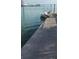 Dock featuring boat mooring on the calm waterfront, offering easy access to water activities and views at 710 Seminole, Clearwater, FL 33755