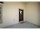 Inviting entryway with a decorative wreath and a doormat at 818 S Main St, Brooksville, FL 34601