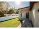 Charming home exterior with a well-manicured lawn and a walkway to the front entrance at 818 S Main St, Brooksville, FL 34601