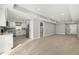 Open-concept living space with a modern kitchen, spacious area, and plenty of natural light at 818 S Main St, Brooksville, FL 34601