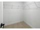 Bright walk-in closet featuring wire shelving and clean, modern finishes at 818 S Main St, Brooksville, FL 34601