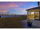 Stunning backyard featuring a screened-in porch with views of the lake at 8337 Abalone Loop, Parrish, FL 34219