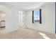Sunlit bedroom with ample closet space, neutral carpeting, and a window with neighborhood views at 8337 Abalone Loop, Parrish, FL 34219