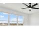 Bedroom showcasing a ceiling fan and large windows offering a view of the surrounding community at 8337 Abalone Loop, Parrish, FL 34219