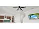 Bright living room featuring recessed lighting, a ceiling fan and an entertainment area with a large screen television at 8337 Abalone Loop, Parrish, FL 34219
