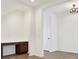 Versatile room showcasing wood flooring, built-in desk area, and neutral paint for personalization at 8337 Abalone Loop, Parrish, FL 34219