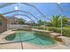 Inviting screened-in pool with lush landscaping, lounge chairs, and sunny sky at 9117 Brindlewood Dr, Odessa, FL 33556