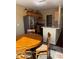 Bright kitchen features wood cabinets, stainless steel appliances, and a cozy breakfast nook at 10002 Bradwell Pl, Tampa, FL 33626