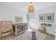 Well-appointed Bedroom with a modern crib, stylish decor, and plush rug at 10934 Sundrift Dr, Tampa, FL 33647