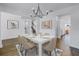 A formal dining room featuring hardwood floors and ample space for entertaining at 10934 Sundrift Dr, Tampa, FL 33647