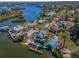 Waterfront home with private dock, boat lift, and lush landscaping, offering stunning water views at 1264 N Florida Ave, Tarpon Springs, FL 34689