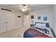 Game room featuring carpeted floors, bright walls, a ceiling fan and gaming themed decor at 12851 Tortoise Shell Pl, Riverview, FL 33579
