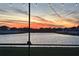 Beautiful sunset reflecting on the serene lake at 12851 Tortoise Shell Pl, Riverview, FL 33579