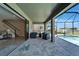 Stunning pool and patio view from the house at 12851 Tortoise Shell Pl, Riverview, FL 33579