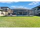 A spacious screened-in pool area offers an inviting outdoor living space at 12851 Tortoise Shell Pl, Riverview, FL 33579