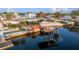 Waterfront home with a boat dock, a gazebo and a nicely landscaped backyard at 13633 Britton Dr, Hudson, FL 34667