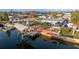 Waterfront home with a boat dock, a gazebo and a nicely landscaped backyard at 13633 Britton Dr, Hudson, FL 34667