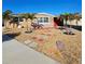 Cozy single-story home with a rock path and manicured front yard, offering curb appeal and charm at 13633 Britton Dr, Hudson, FL 34667