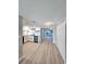 Open floor plan with eat-in kitchen featuring new stainless appliances and hardware at 13633 Britton Dr, Hudson, FL 34667