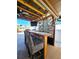 An outdoor bar offers a spot to watch TV, visit, and enjoy outdoor life at 13633 Britton Dr, Hudson, FL 34667